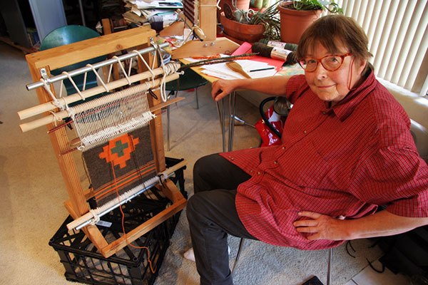 Jutta Engelhardt working on a loom making a Navajo Rug in Phoenix, Arizona